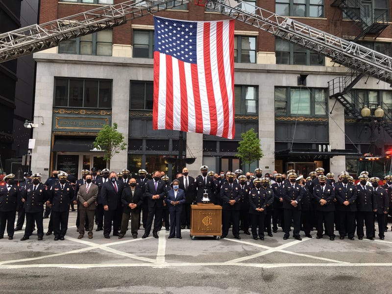 Members of the Chicago Fire Department, including some firefighters who went to New York after the 9/11 terror attacks, held a remembrance ceremony Friday in the River North neighborhood.