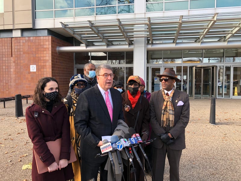 Attorney Gergory Kulis, representing the family of Treasure Hendrix, stood with her mother, Cynthia Hendrix, outside CPD headquarters.