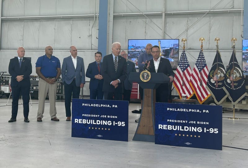 Gov. Josh Shapiro (right) addresses media on the timeline for reopening I-95, while appearing with President Joe Biden at Philadelphia International Airport.