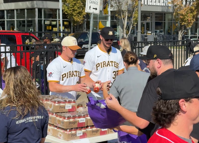 Paul Skenes and Henry Davis work on Clemente Day