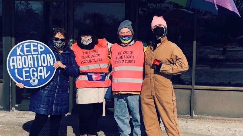 Rainbow umbrellas, kazoos and tenacity: On the front line with Metro Detroit abortion clinic defenders