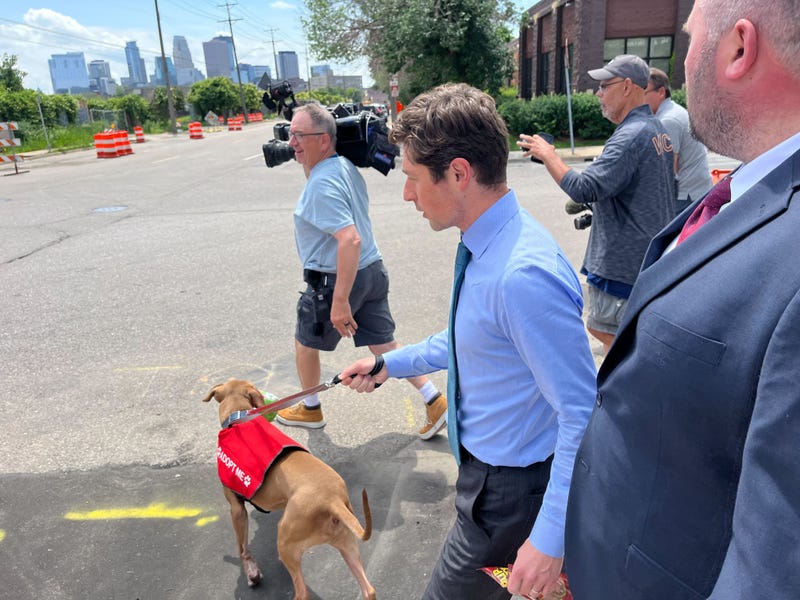 Minneapolis Mayor Jacob Frey takes a pooch on a test-drive, part of a new program in the city giving people the opportunity to spend the day with a shelter dog.