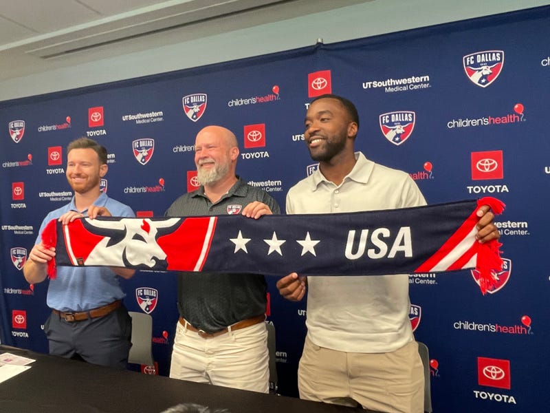 FC Dallas President Dan Hunt with player Shaq Moore