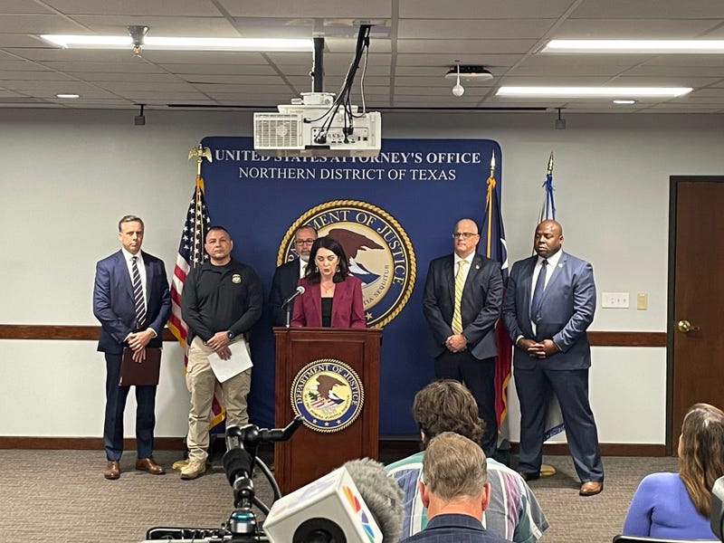Acting U.S. Attorney Nancy Larson speaks at the Federal Building in Downtown Dallas