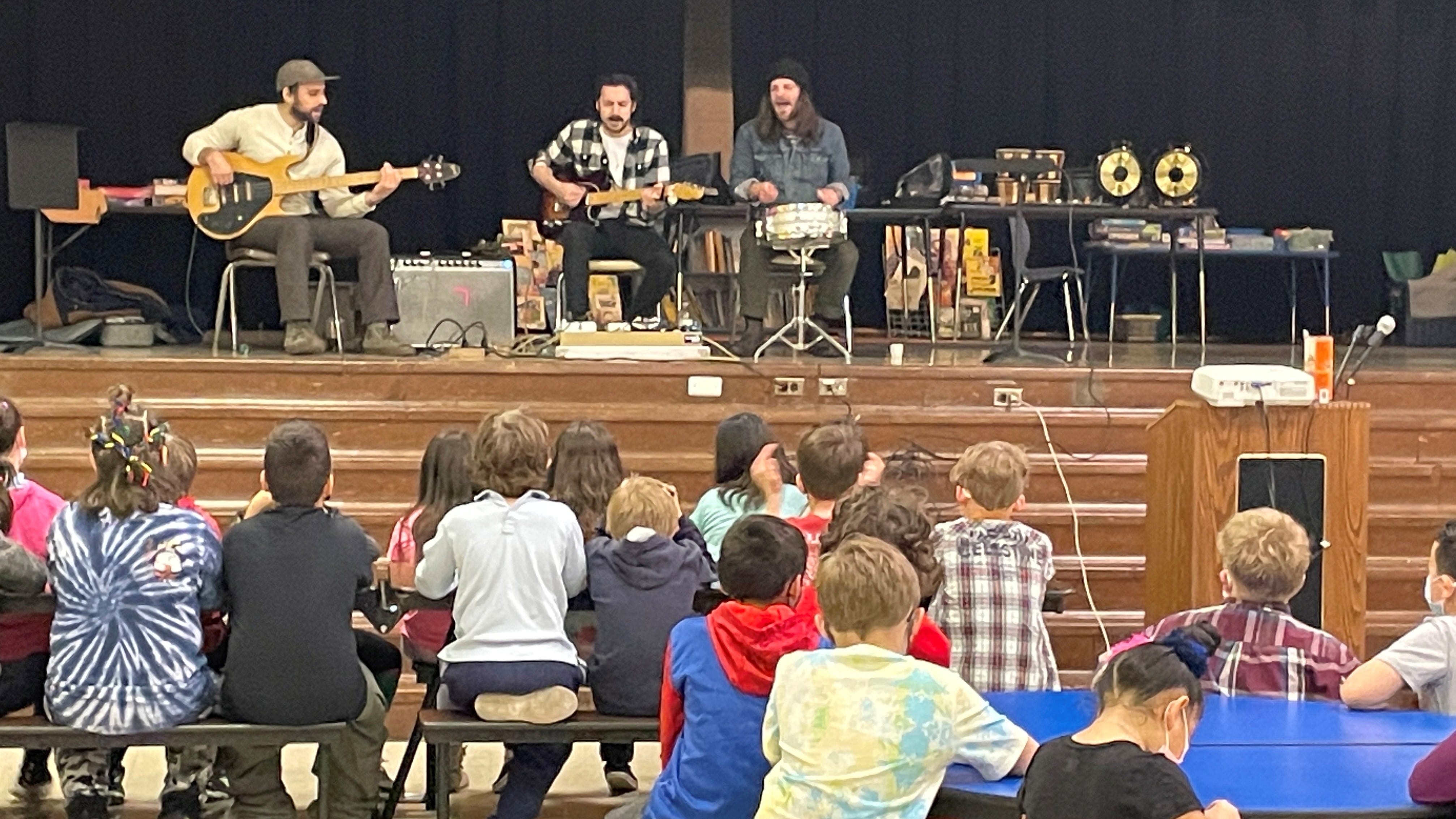 Rock band surprises Fishtown students with concert, new instruments