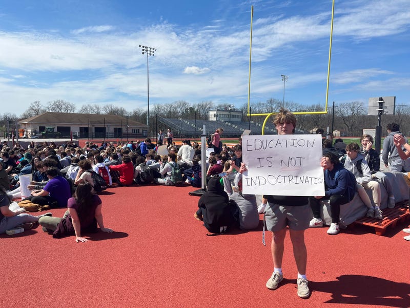 Perkiomen Valley High School students stage a walk-out in opposition to a school board proposal to remove explicit materials from school libraries.