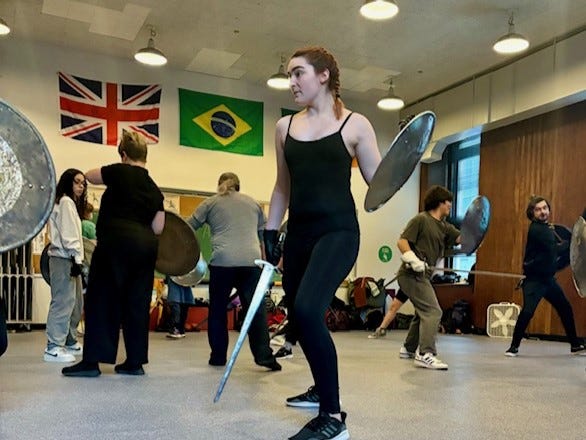 A Columbia College student takes part in a class designed to teach the art of wielding weapons and using fight choreography.