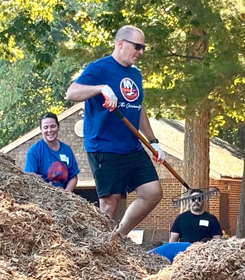 Mathieu Darche tackles a pile of mulch