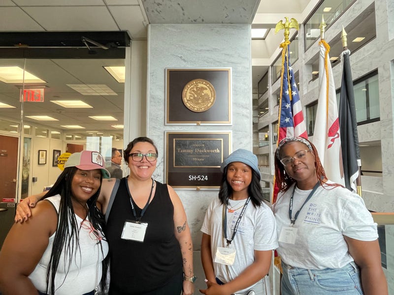 Jade Lee (second from right) and Robin Koelsch (second from left) pose while in Washington, D.C. for the national "Do the Write Thing Summit."
