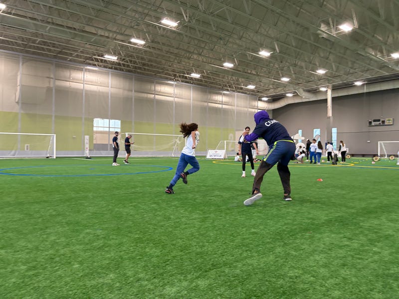 Ten-year-old Eliannah Allen shows off her running skills at Bank of America's Sports with Us clinic at the ComEd Recreation Center in Pilsen Wednesday morning.