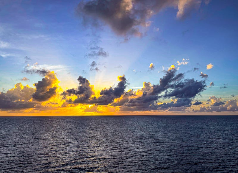 The sun sets over the Atlantic Ocean.
