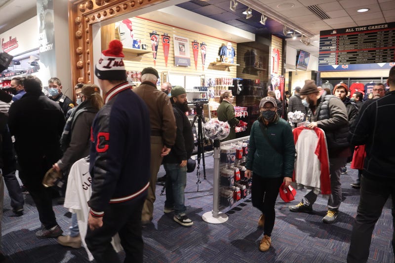 Fans stand in line to finalize purchases of new Cleveland Guardians gear during the club's official re-opening of the team store on Friday, Nov. 19, 2021.