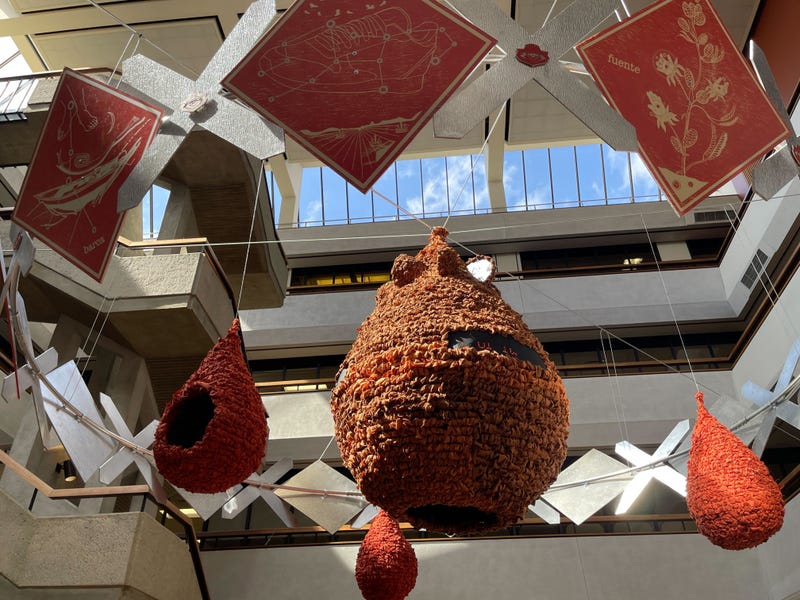 "De Tierra a Estrellas" as it hangs in the atrium of Penn's McNeil Building.