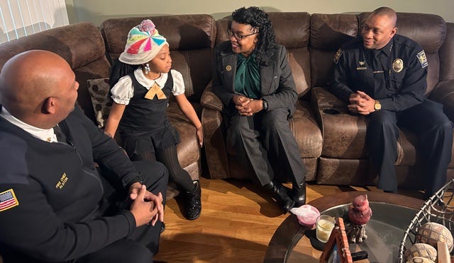 Lynwood Mayor Jada Curry with Mia Dates in her home