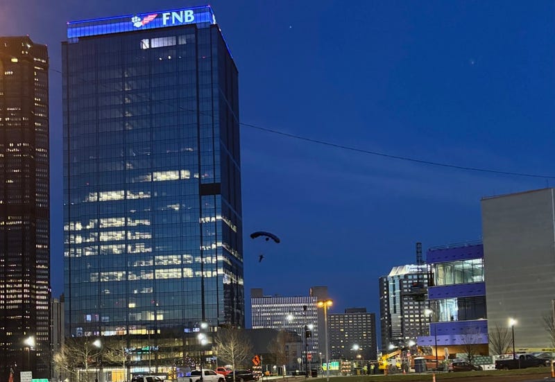 Person jumping off FNB building