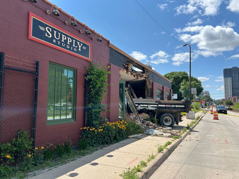 Were learning no was one was hurt after an Xcel Energy truck crashed through an art business storefront in northeast Minneapolis this afternoon.