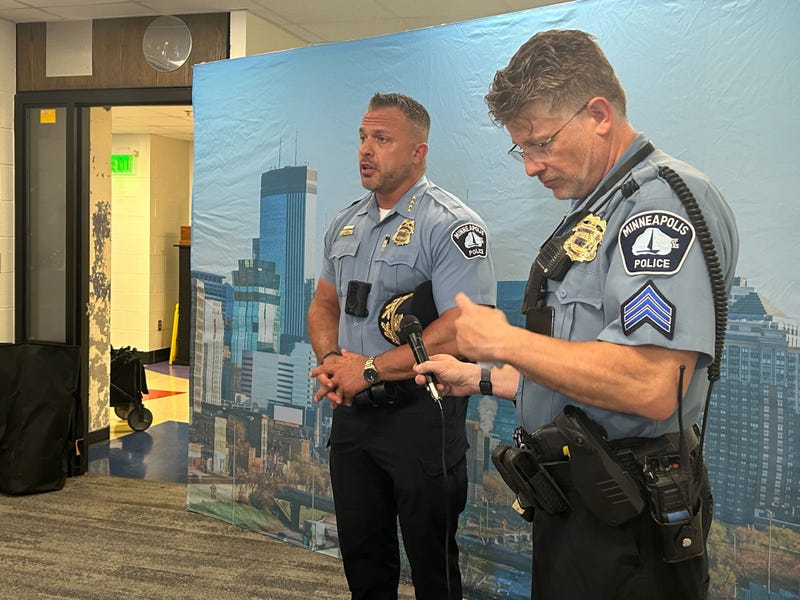 Police Chief Brian O'Hara (L) talks about "Operation Safe Summer" on Wednesday in downtown Minneapolis.