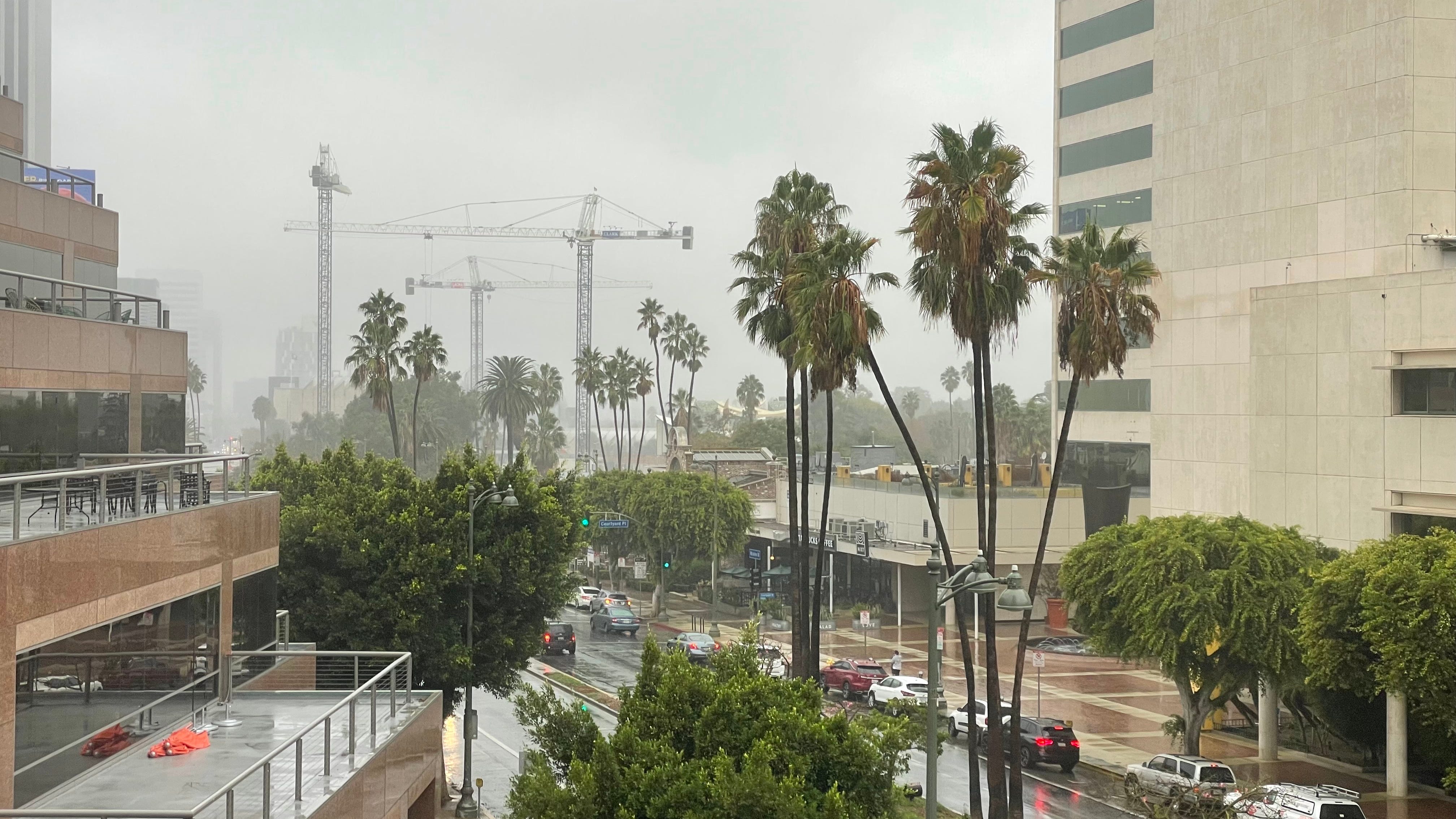 Storm system moving south into L.A. County with rain, winds, surf warning