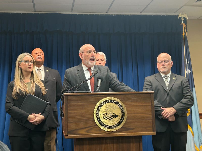 U.S. Attorney Andrew Luger (center) and other from the Department of Justice and DEA making the announcement Tuesday.