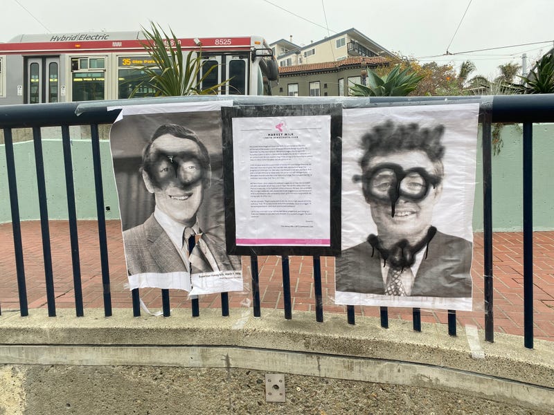 Photographs memorializing former San Francisco Supervisor Harvey Milk and Mayor George Moscone on the 43rd anniversary of their assassination were defaced on Wednesday.