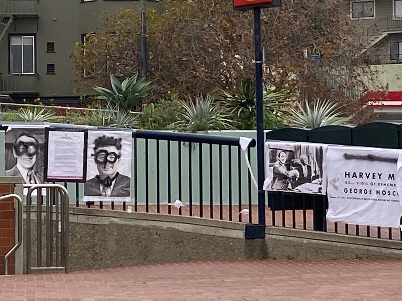 Photographs memorializing former San Francisco Supervisor Harvey Milk and Mayor George Moscone on the 43rd anniversary of their assassination were defaced on Wednesday.