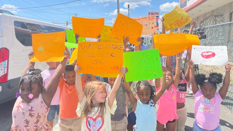 Kids from Faulk's Kidz Kum 1st join a rally in concurrence with Jamal Johnson's walk from Philadelphia to Washington, D.C. to bring awareness about both police brutality and Philadelphia's gun violence crisis.
