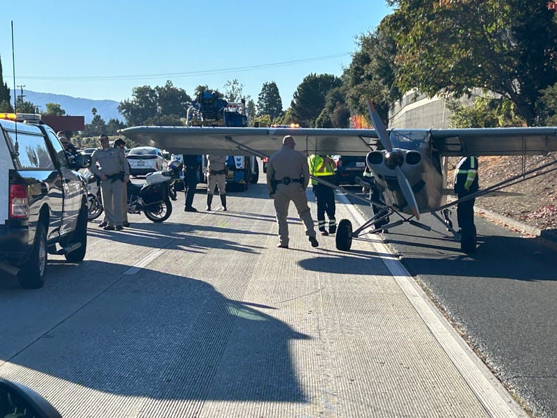 Plane sits on the side of Highway 85 in Cupertino after making an emergency landing.