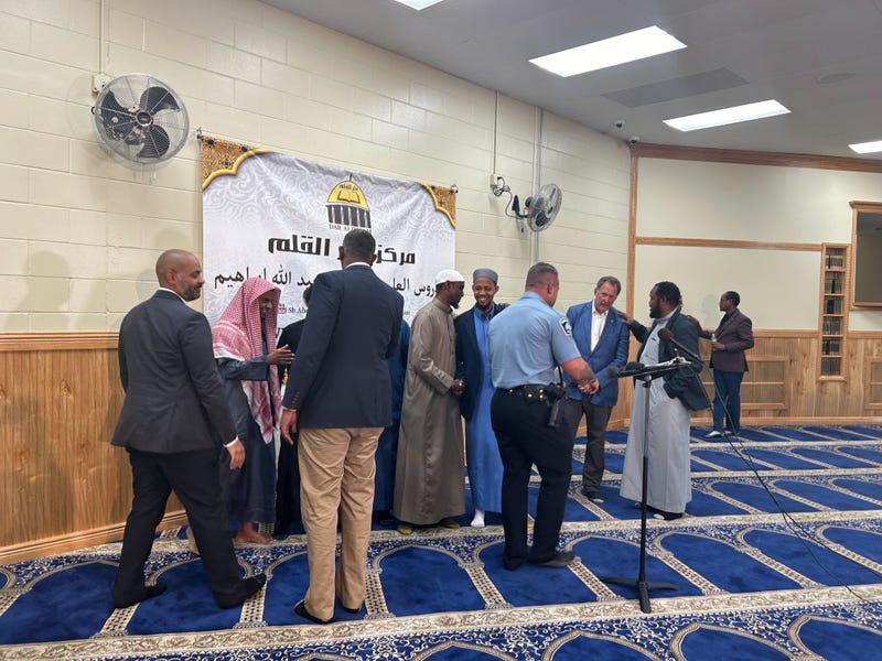 Minneapolis Police Chief Brian O'Hara (center) meets with members of the Dar Al-Qalam Islamic Center in Northeast Minneapolis Tuesday.