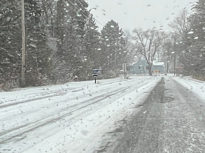 Snow covered secondary roads like this one across the Twin Cities early Monday morning. National Weather Service forecasters say the snow will continue most of the week, with heavier accumulations expected south of the Twin Cities.