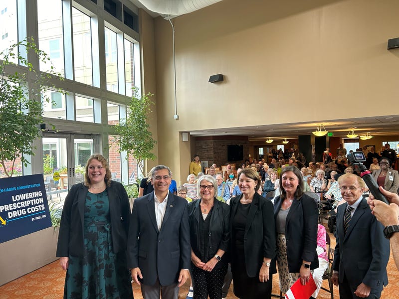 Health and Human Services Sec. Xavier Becerra (second from left) and Senator Amy Klobuchar (third from right) spoke Monday morning about the lowering of prescription drug prices for seniors.