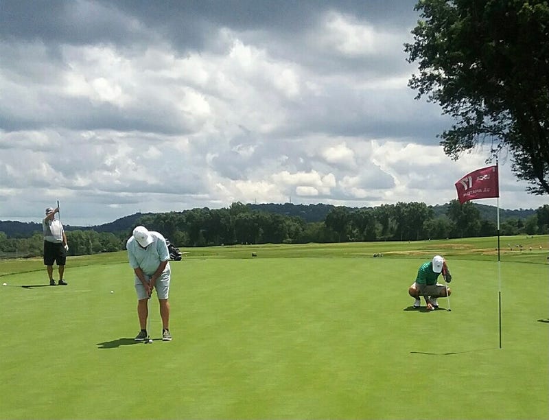Jim Colony putting at Oakmont