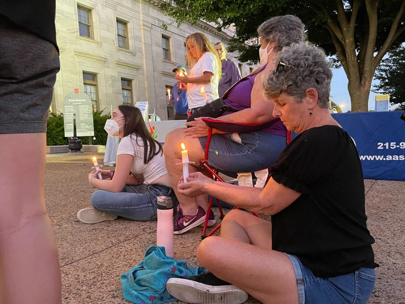 A group holding a vigil for overdose victims outside the Delaware County Courthouse in Media.