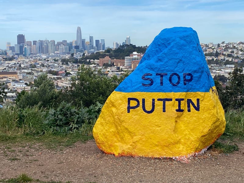 The Bernal Heights rock seen from the front with "Stop Putin" on it.