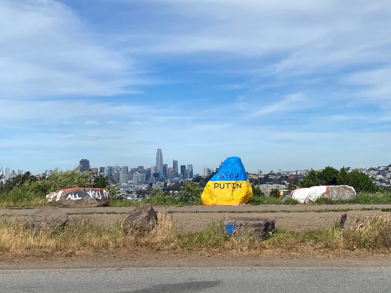 "Stop Putin" with the San Francisco skyline in the background.
