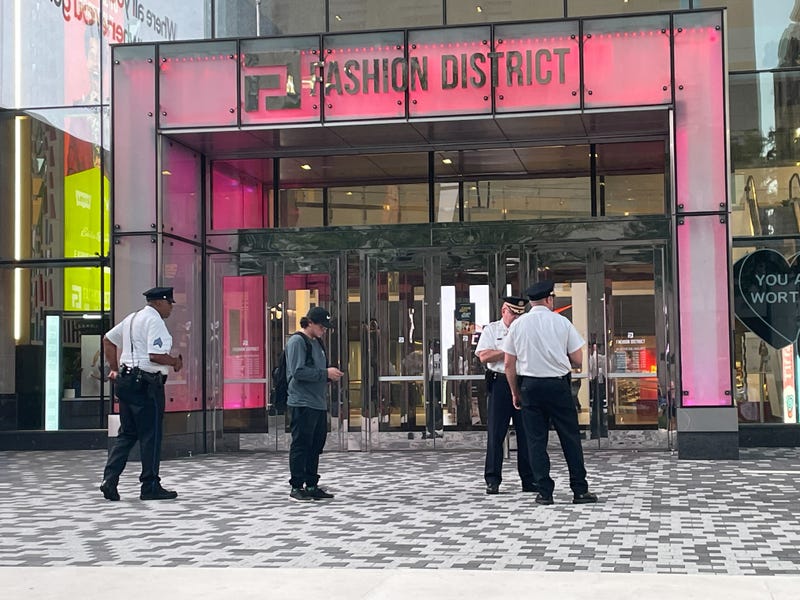 Police at the scene where a shot was fired inside the Fashion District on Sept. 13, 2022.