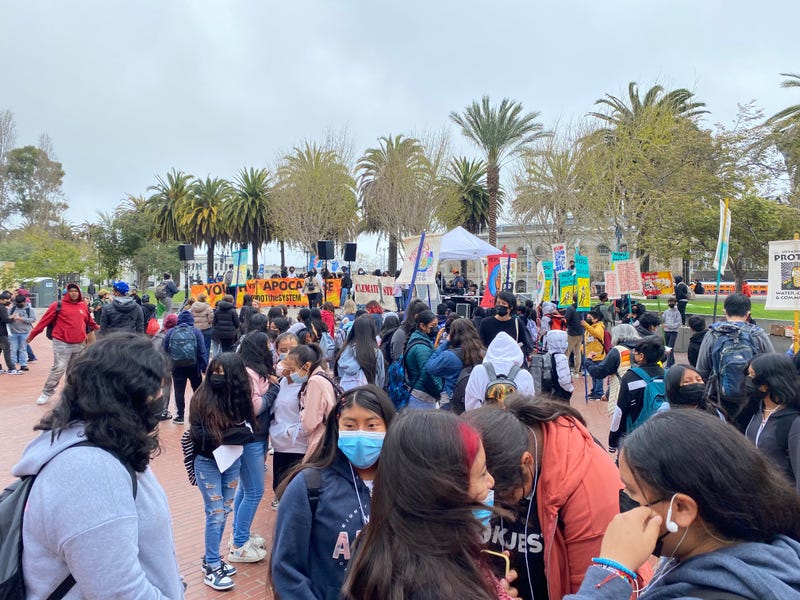 Hundreds of striking Bay Area students marched through San Francisco on Friday, opposing those they say are profiting from climate change.