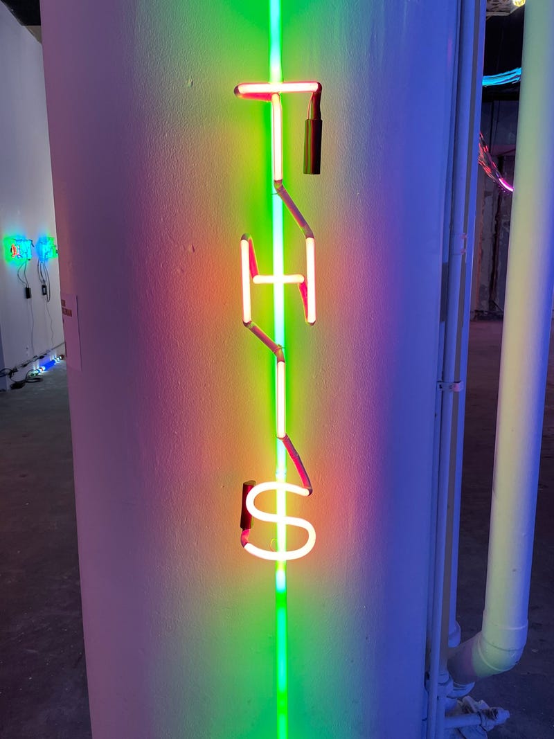 "This" neon sign at the Neon and Light Museum