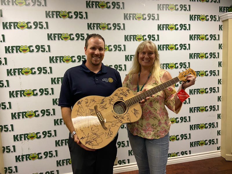 Corona Rotary President Brian Tressen with K-Frog's Pepper
