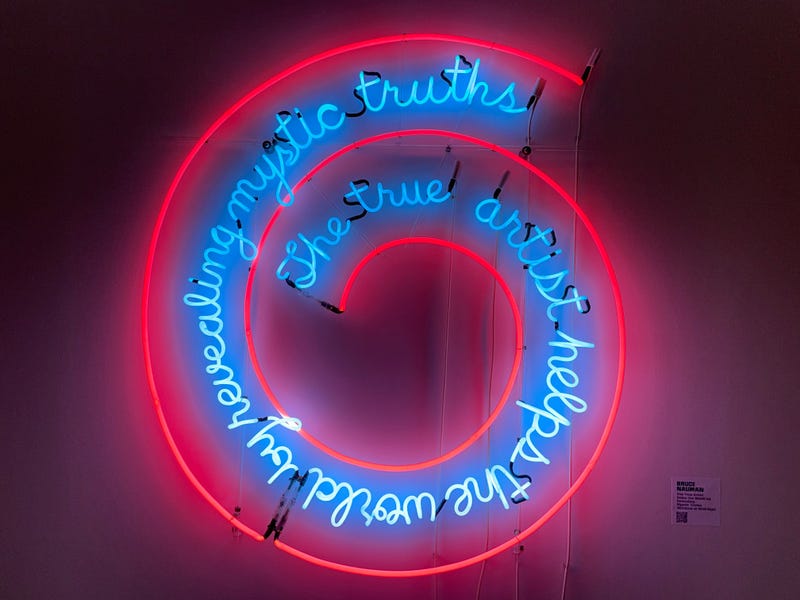 "The true artist helps the world by revealing mystic truths" neon sign at the Neon and Light Museum
