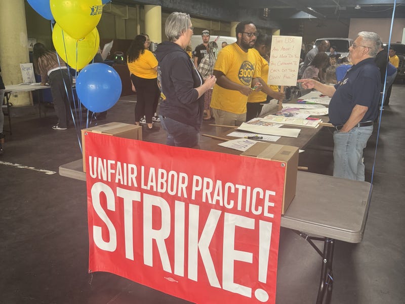 workers making picket signs