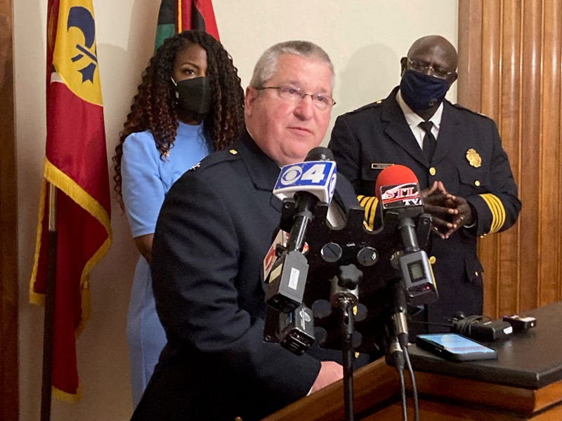 Interim Police Chief Michael Sack answers a question as Mayor Tishaura Jones and retiring Chief John Hayden look on.