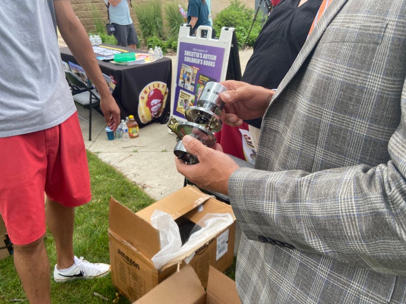 Sheletta Brundidge and Amazon distribute door locks to families with autistic children