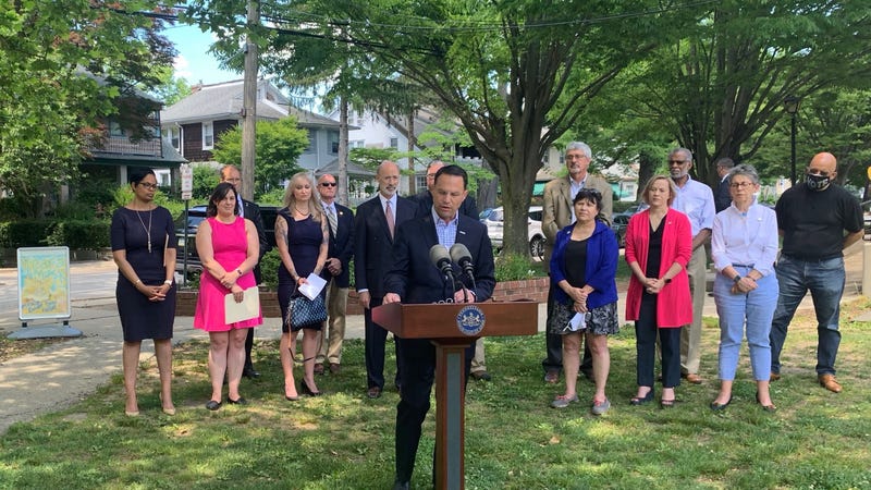 Pennsylvania Attorney General Josh Shapiro at the microphone, and Governor Tom Wolf to his left, at a Women's Health Caucus news conference in Narberth, Pennsylvania this past week.