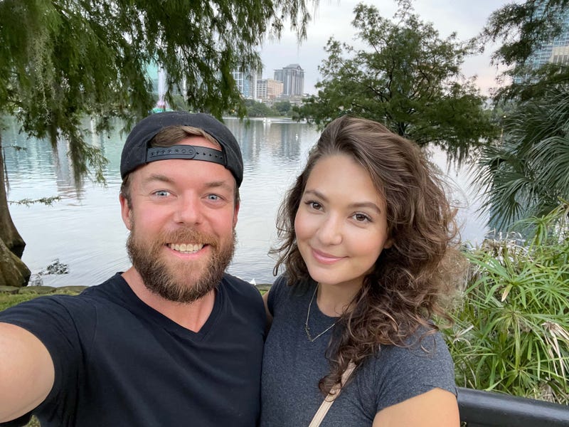 My wife and I posing in front of Lake Eola