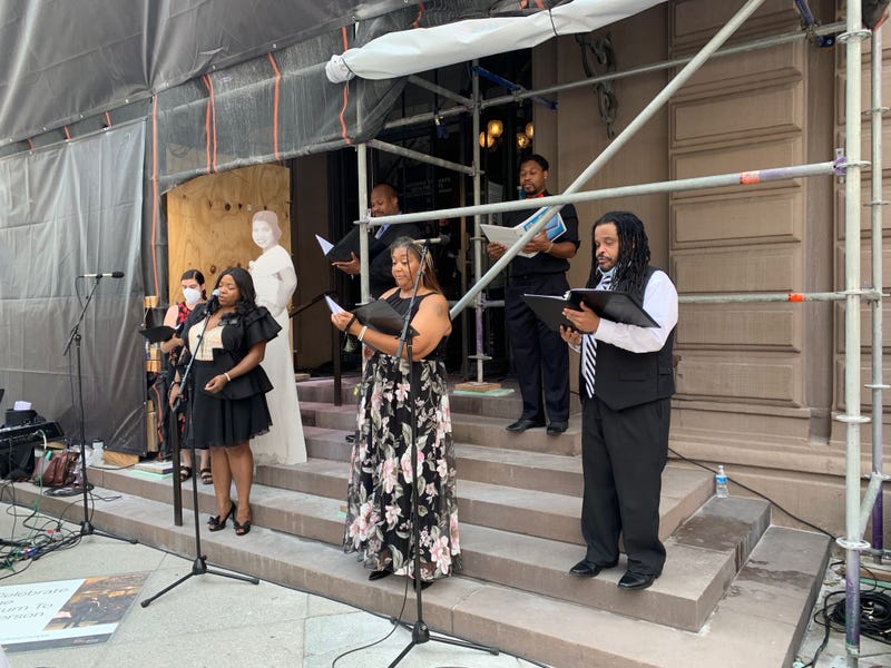 Singers performing God Bless America at the unveiling of the Marian Anderson statue in Philadelphia.