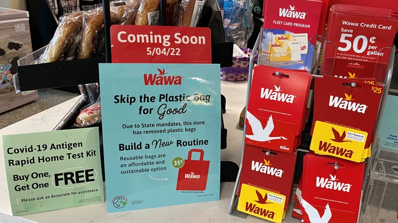 Signs at Wawa for reusable bags.
