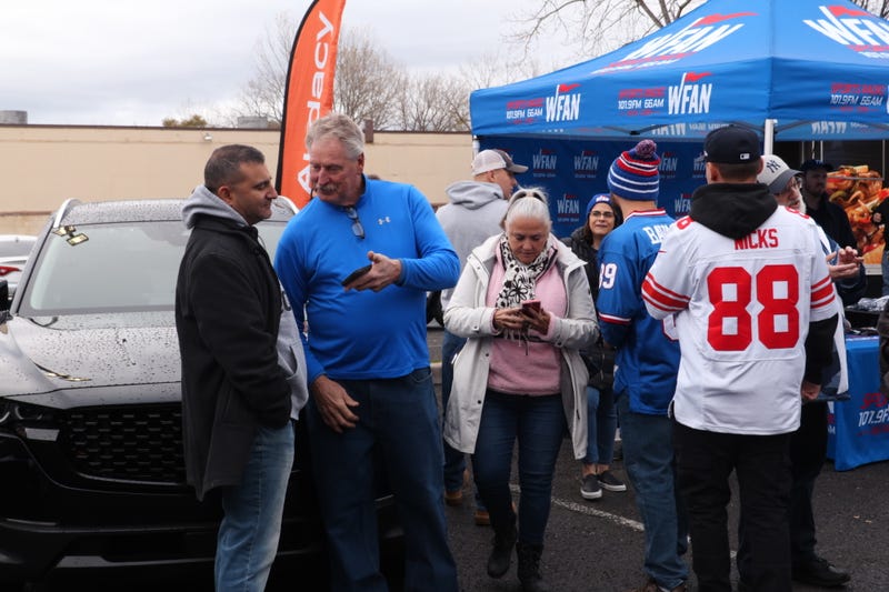 Tiki & Tierney's Tailgate and live Football Sunday broadcast at Redd's