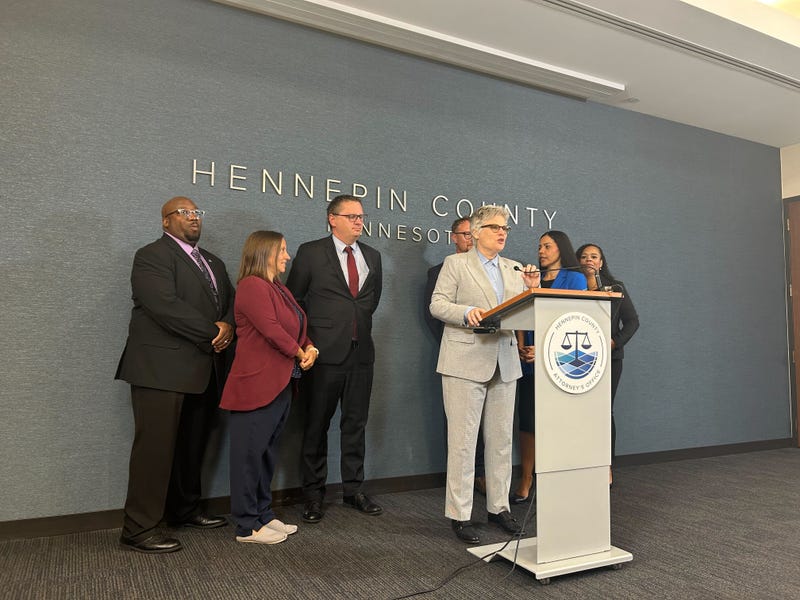 Hennepin County Attorney Mary Moriarty announced that additional charges have been filed against a man suspected in a string of shootings near a homeless encampment.