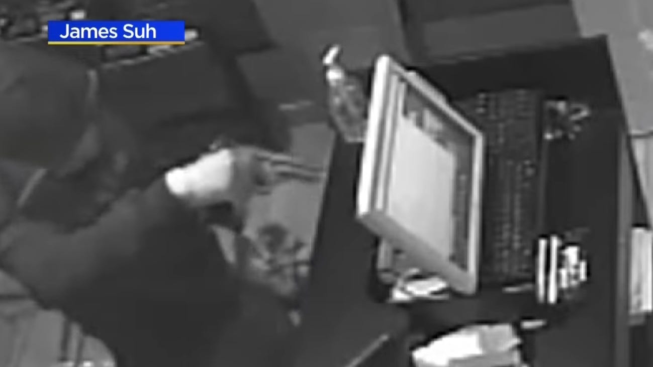 WATCH: Business owner knocks gun out of would-be robber’s hands in Portage Park