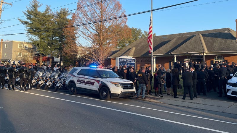 A large group of law enforcement officers came to Givnish Funeral Home in Northeast Philadelphia to mourn the loss of Temple University Police Officer Chris Fitzgerald Thursday.
